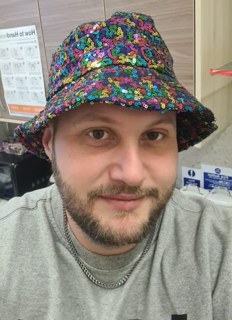 Senior Support Worker, Chris in his glam hat